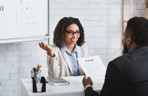 friendly personnel manager interviewing black cand 2021 08 28 23 04 36 utc 300x200
