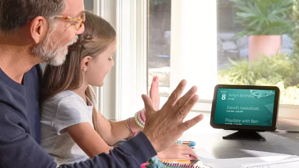 People gesturing to an Echo device