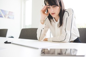 Stressed young businesswoman at office desk with 2022 03 07 23 56 38 utc