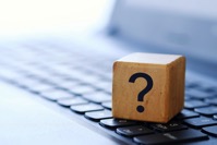 A question mark on a wooden cube on a computer key 2021 08 29 10 30 03 utc