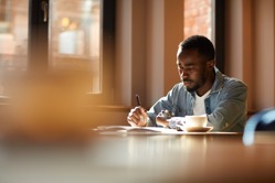 African man working at cafe 2022 02 02 03 57 51 utc