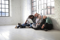 Banners and Alerts and People Sitting On The Floor Feeling Exhausted Free Stock Photo