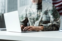 Cropped view of soldier in camouflage uniform usin 2021 09 14 20 23 50 utc