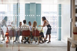 Female boss stands leaning on table at business me 2022 03 30 20 23 45 utc