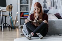 Girl thinking over notebook 2022 03 30 20 23 42 utc
