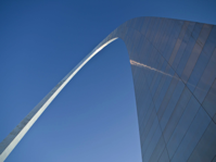 Grey Arc Building Under Blue Sky Free Stock Photo