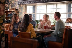 Group of friends meeting for lunchtime drinks in t 2022 02 08 22 39 29 utc