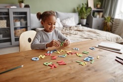 Little african american girl learning english 2021 12 21 20 26 15 utc