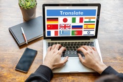 Man working on a laptop with the word translate on 2021 08 27 21 35 42 utc