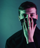 Man Holding Black Mask Free Stock Photo
