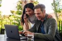 Man sitting beside woman looking at laptop photo Free Dating Image on Unsplash