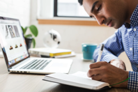 Man Using Ballpoint Pen Free Stock Photo