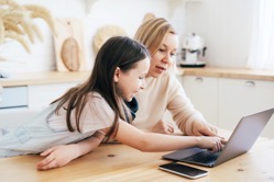Mom and daughter surf in a laptop business woman 2022 02 01 22 38 30 utc