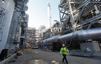 In this Nov. 16, 2015 file photo, a worker walks through a section of the Mississippi Power Co. carbon capture plant in DeKalb, Miss.

Rogelio V. Solis | AP
