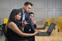 people working at computers