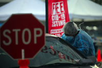 Virus Testing Location - A drive-through testing site in Oakland, Calif., on Thursday.Credit...Jim Wilson/The New York Times