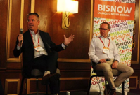 Bisnow/Andrew Martinez Outshine Properties' Bill Hunter speaks as CRISPR Therapeutics' Denis Desmond listens at a Bisnow event Oct. 21, 2021. 