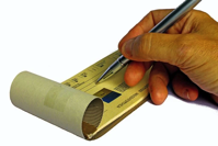 checkbook with pen writing check