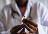 Person Holding Injection Free Stock Photo