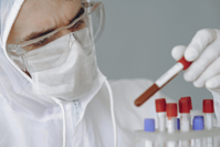 Photo of Person Wearing Face Mask and Protective Goggles Free Stock Photo