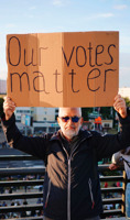 Protester Holding Sign Free Stock Photo