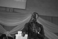Person addressing an audience.