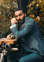Businessman sitting at table.