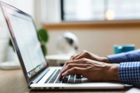Person Using Macbook Free Stock Photo