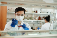 Scientist conducting experiment in lab