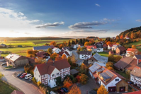 town in countryside during sunset