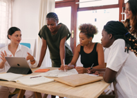 Photo of women in a strategy meeting.