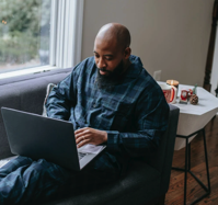 Working from Home... man with laptop.