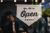 Shallow Focus Photo of White Open Sigange Free Stock Photo