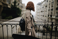 Shallow Focus Photography Of Woman Beside Fence Free Stock Photo