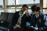 People sitting in an airport.