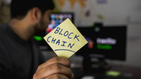 person holding postit with 
