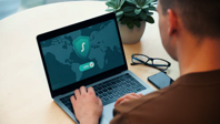 Cybersecurity... person work on laptop.