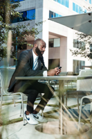 Entrepreneur working at table.