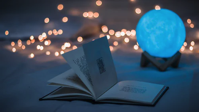 book and crystal ball.