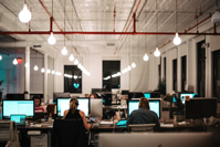 open office space with people working.