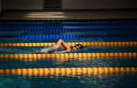 person swimming in a pool.