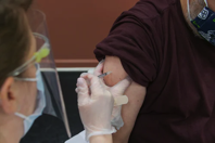 person receiving a shot