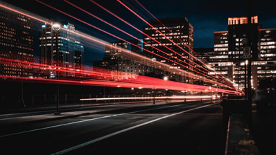Fast - Street with timelaps blurred light streaks.