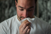 Man with tissue