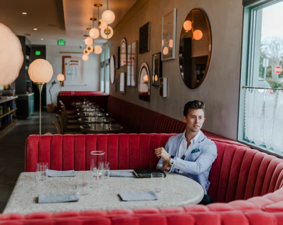 Venture Capital - Person sitting in restaurant booth
