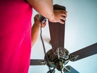 Vacuuming the ceiling fan low angle view 2021 08 30 06 59 54 utc