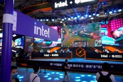 Visitors are seen at the intel booth during
