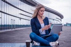 Young career woman working outside with her device 2022 03 11 08 31 09 utc