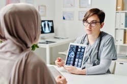 Young confident radiologist in uniform commenting 2022 04 11 14 43 27 utc