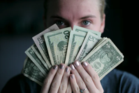person holding money